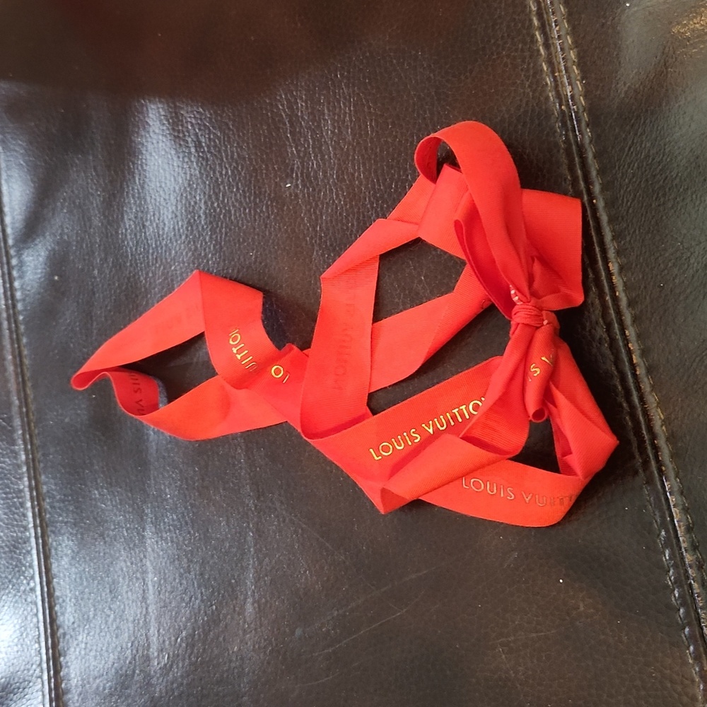 Louis Vuitton medium ribbon.